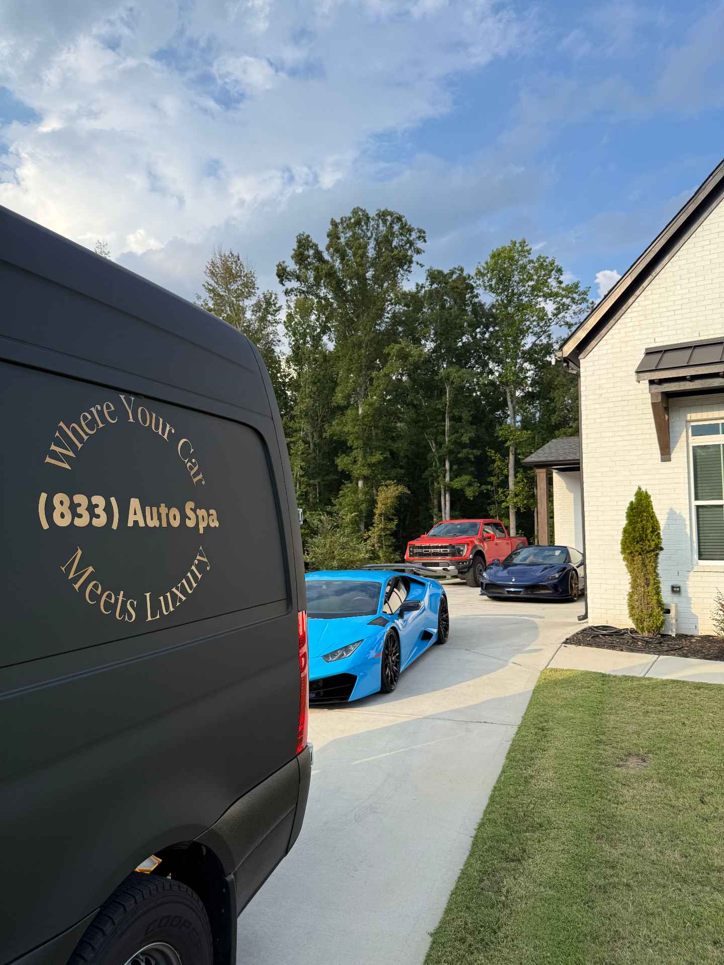 Luxury garage with Ferrari and Lamborghinis detailed in Atlanta